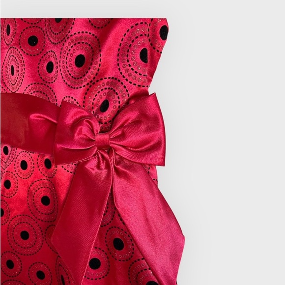 *2 for $20* Red dress with black & silver designs and side bow. Size juniors 14. - Picture 5 of 11